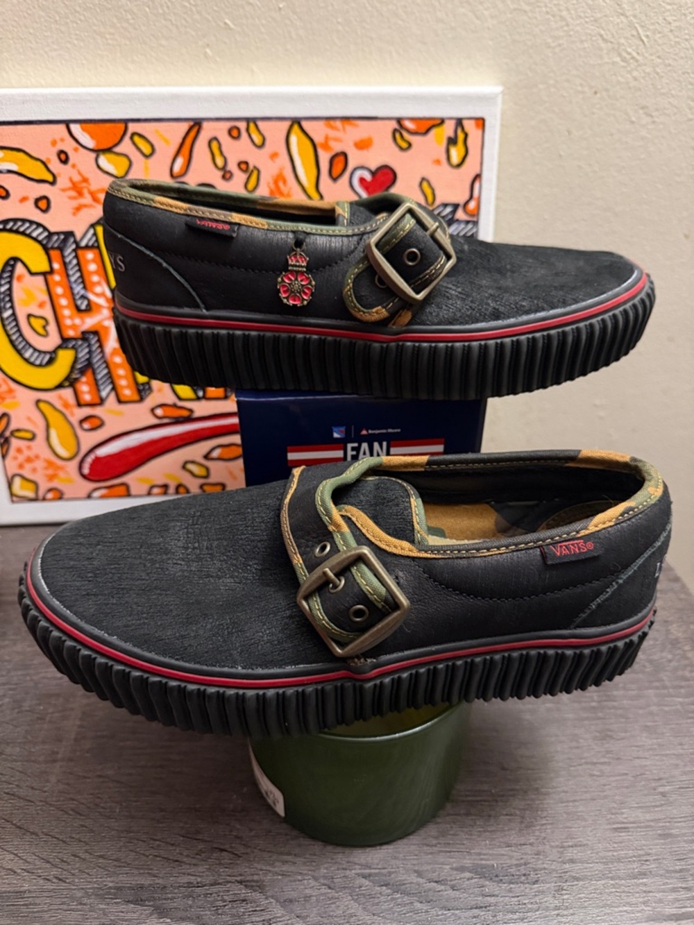 Vans Black Slip-On Sneakers with Red Trim and Buckle list boys